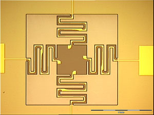 Piezoelectric flexure-actuated MEMS with four self-actuating serpentines.